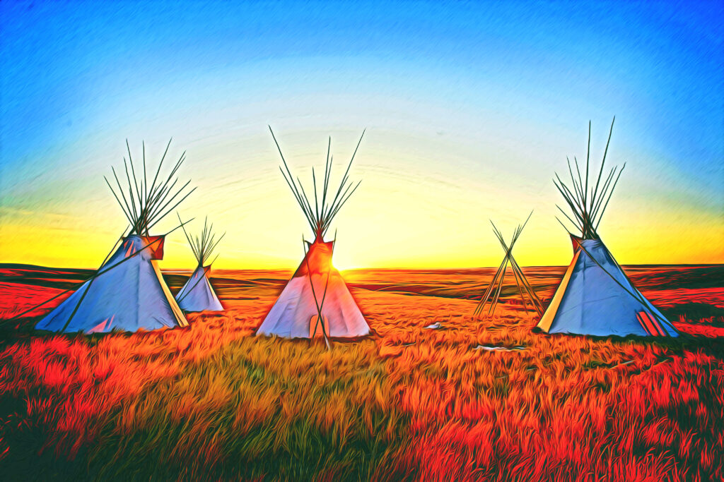 Native North American tipis at sunrise on the plains